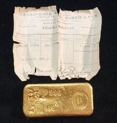 Gold ingot
N° 142547 and 55408. 
Indicated...