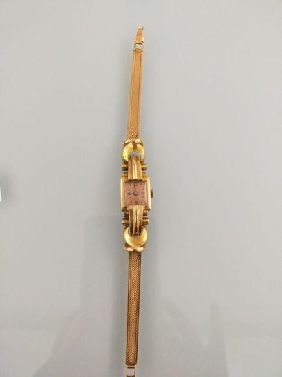 Lady's tank wristwatch in 18k gold
Gross...