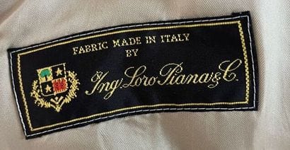 Set of three coats including one HERMES 
Stains...