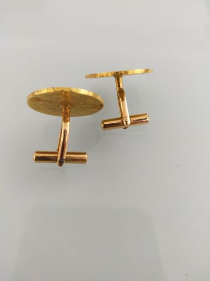 Pair of 18k yellow gold cufflinks set with...