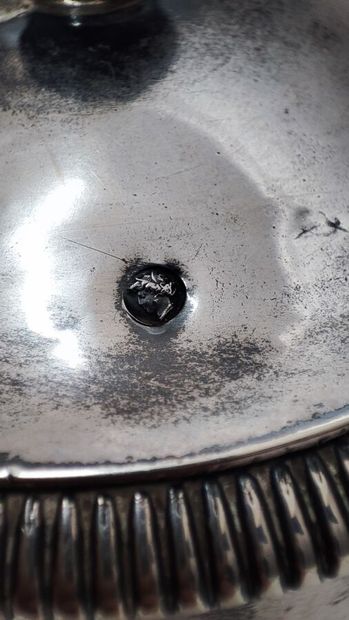 Silver coffee pot with turned blackened wood...