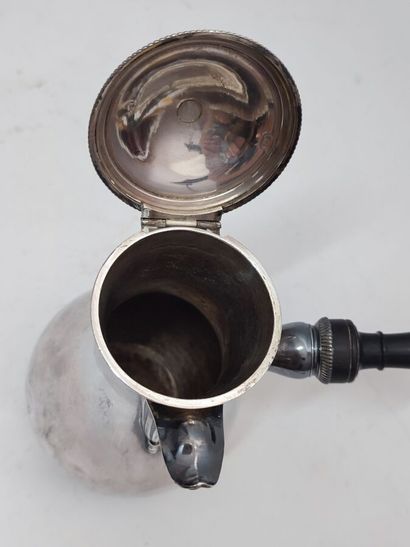 Silver coffee pot with turned blackened wood...