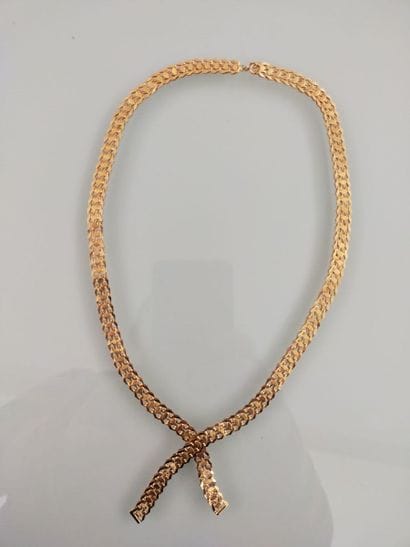 Tie necklace in 18 K yellow gold with openwork...