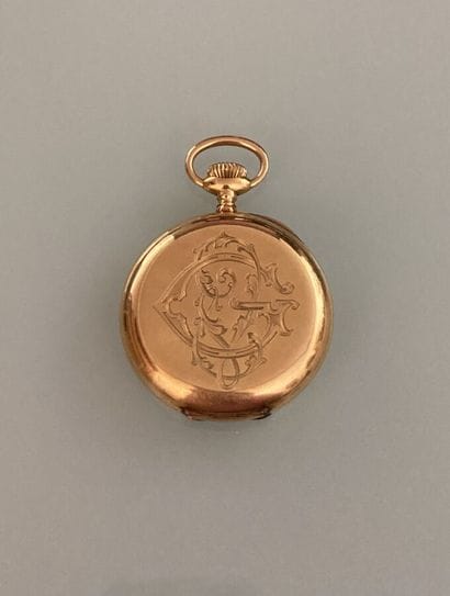 Pocket watch in 18k yellow gold 
Monogrammed...