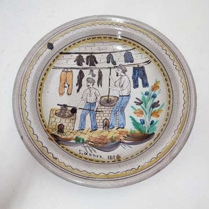 Polychrome ceramic dish decorated with a...