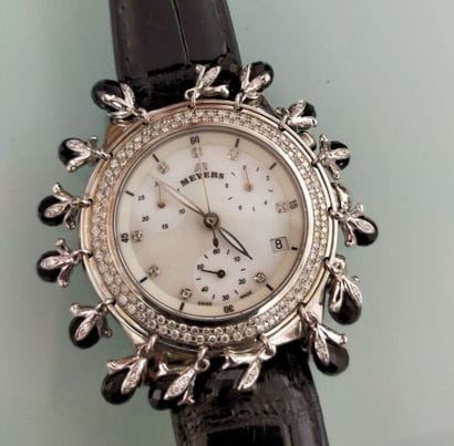 MEYERS
Montre en acier, signée Lady Diamond...