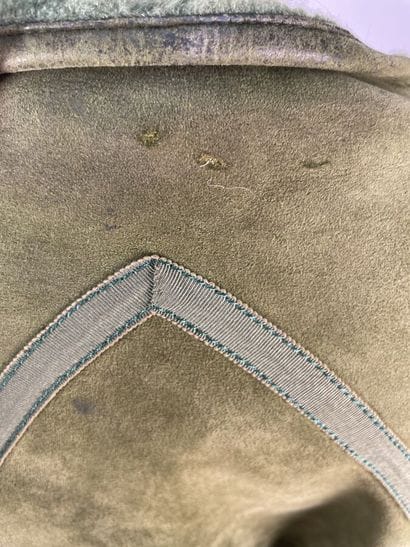 Set of three coats including one HERMES 
Stains...