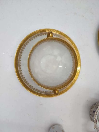 LIMOGES
Two porcelain bowls with handles...