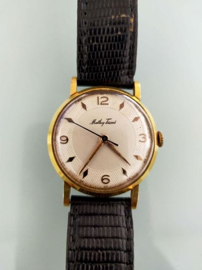 TISSOT
Men's wristwatch, gold case. 
Gross...