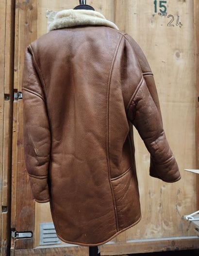 Coat in imitation leather and virgin wool...