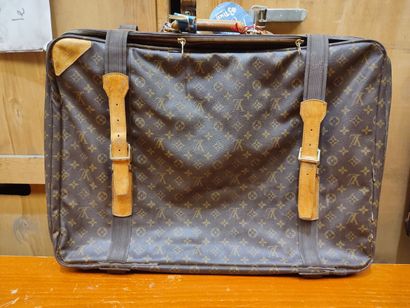 LOUIS VUITTON
Set of two soft suitcases and...