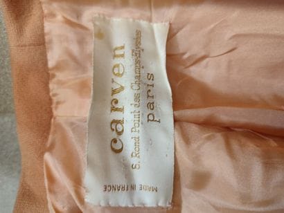 CARVEN
Orange fabric ensemble with single-breasted...