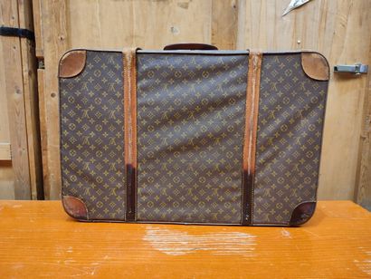 LOUIS VUITTON
Set of two soft suitcases and...