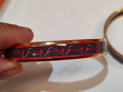 HERMES
Set of two enameled anchor bracelets,...
