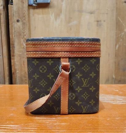 LOUIS VUITTON
Set of three small travel bags:...