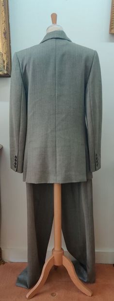 DIOR Christian
Grey herringbone pants and...