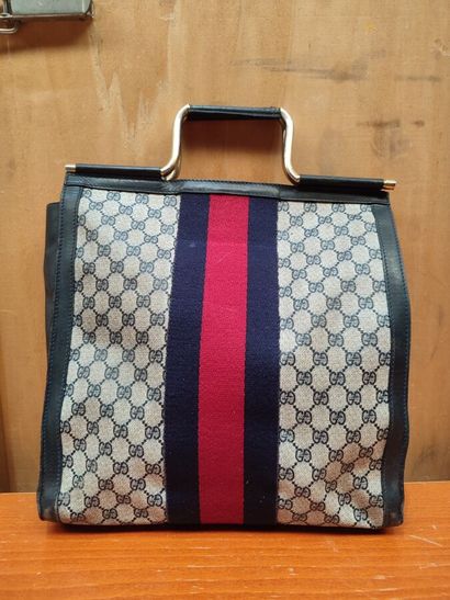 GUCCI
Set of three handbags, two blue and...