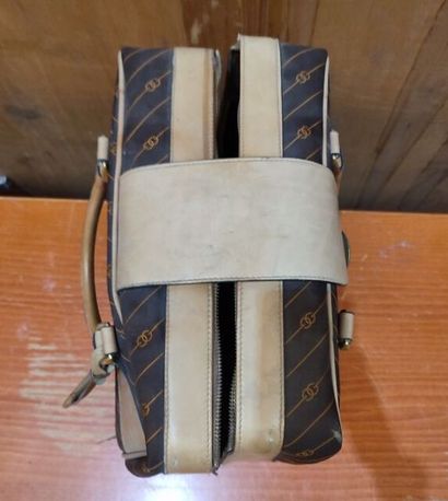 GUCCI
Set of two suitcases in monogrammed...
