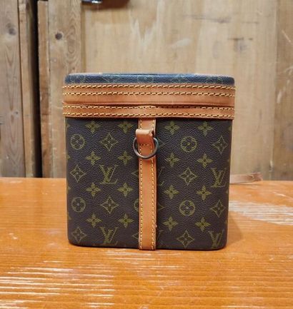 LOUIS VUITTON
Set of three small travel bags:...