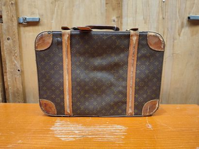 LOUIS VUITTON
Set of two soft suitcases and...