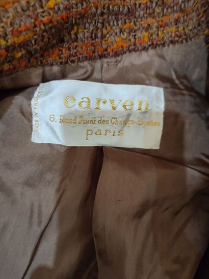 CARVEN
Ochre-toned fabric ensemble with belted...