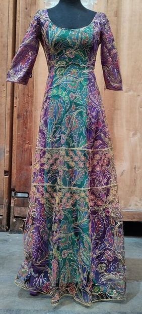 CARVEN
Long dress with green and purple background...