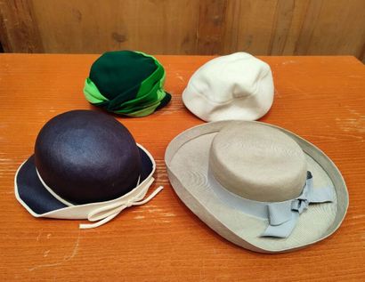 CARVEN
Set of two . hats, one navy blue and...