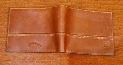 HERMES
Set of small leather goods including...