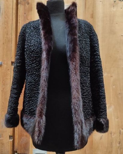 CARVEN FURS
Short jacket in black astrakhan...