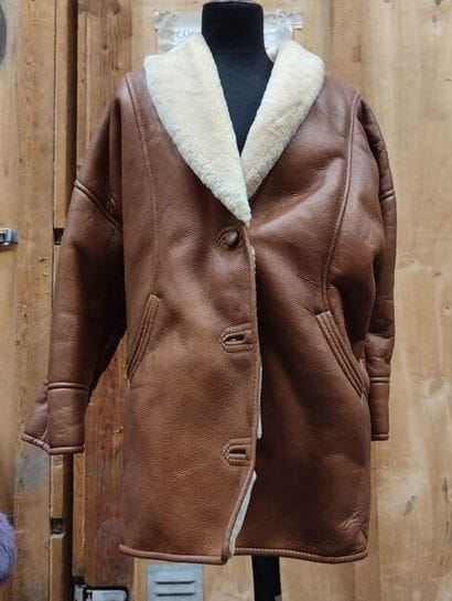 Coat in imitation leather and virgin wool...