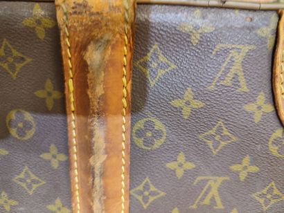 LOUIS VUITTON
Set of two soft suitcases and...