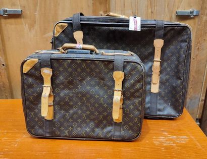 LOUIS VUITTON
Set of two soft suitcases and...