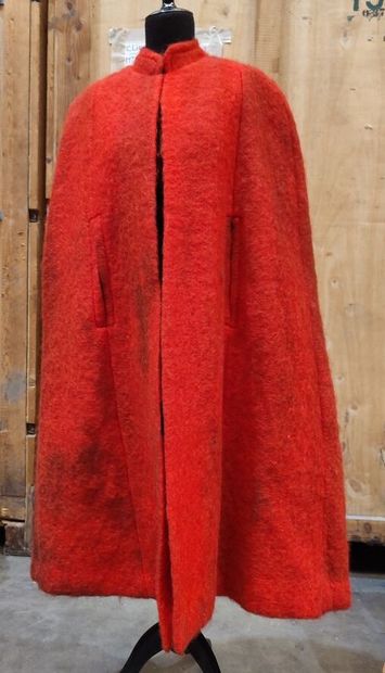 Set including a red cape (stained) and a...