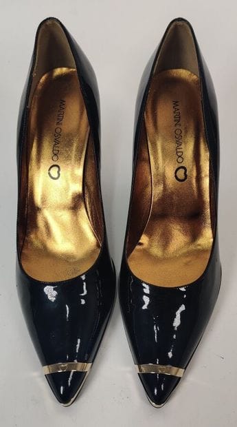 OSVALDO Martini
Pair of black pumps with...