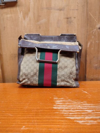 GUCCI
Set of three handbags, two blue and...