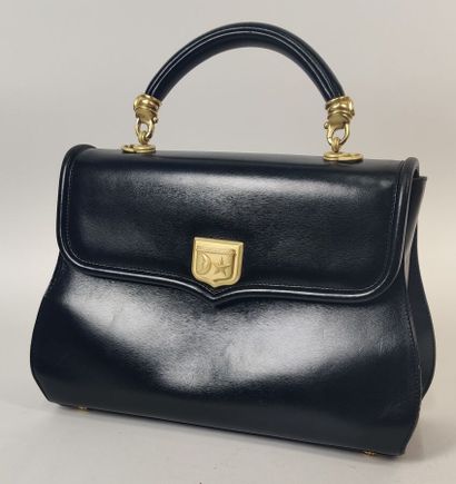BARRY KIESELSTEIN-CORD
Smooth black leather...
