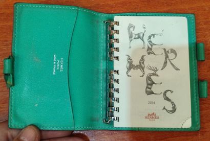 HERMES
Set of small leather goods including...