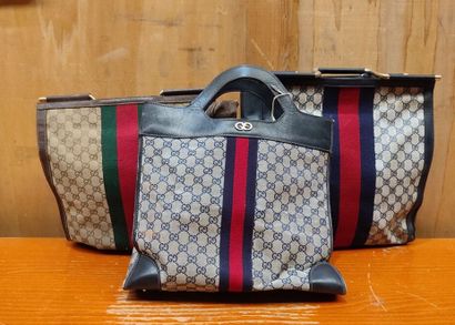 GUCCI
Set of three handbags, two blue and...