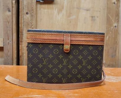 LOUIS VUITTON
Set of three small travel bags:...