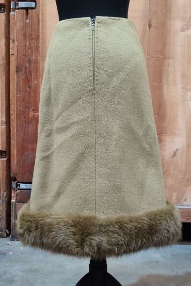 CARVEN
Outfit in green wool and fur bottom...