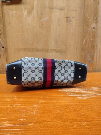 GUCCI
Set of three handbags, two blue and...