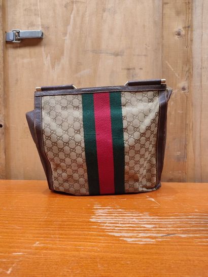 GUCCI
Set of three handbags, two blue and...