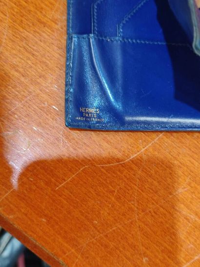 HERMES
Set of small leather goods including...