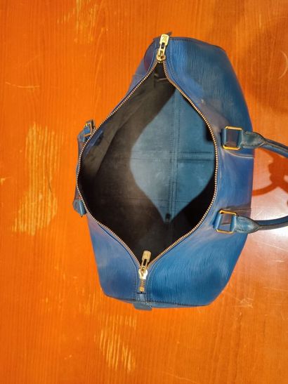 LOUIS VUITTON
Set of two travel bags, keepall...