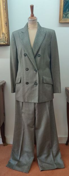 DIOR Christian
Grey herringbone pants and...