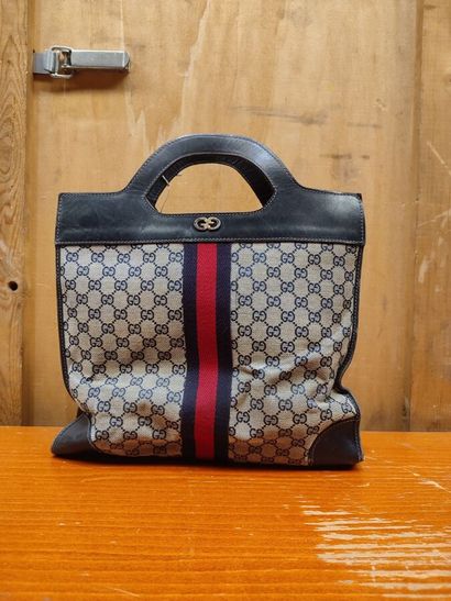GUCCI
Set of three handbags, two blue and...