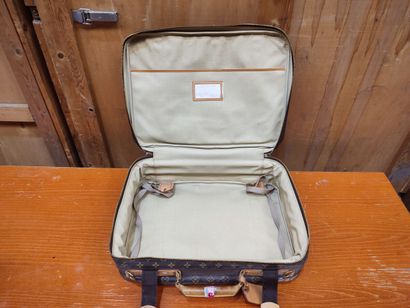 LOUIS VUITTON
Set of two soft suitcases and...