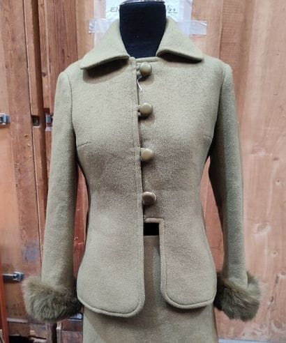 CARVEN
Outfit in green wool and fur bottom...