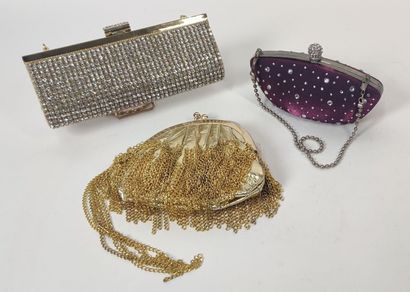 Set of three clutches including:
- A rigid...