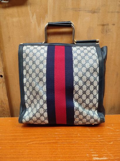 GUCCI
Set of three handbags, two blue and...